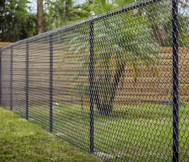 Black Vinyl Coated Chain Link Fence Installed In Dania Beach